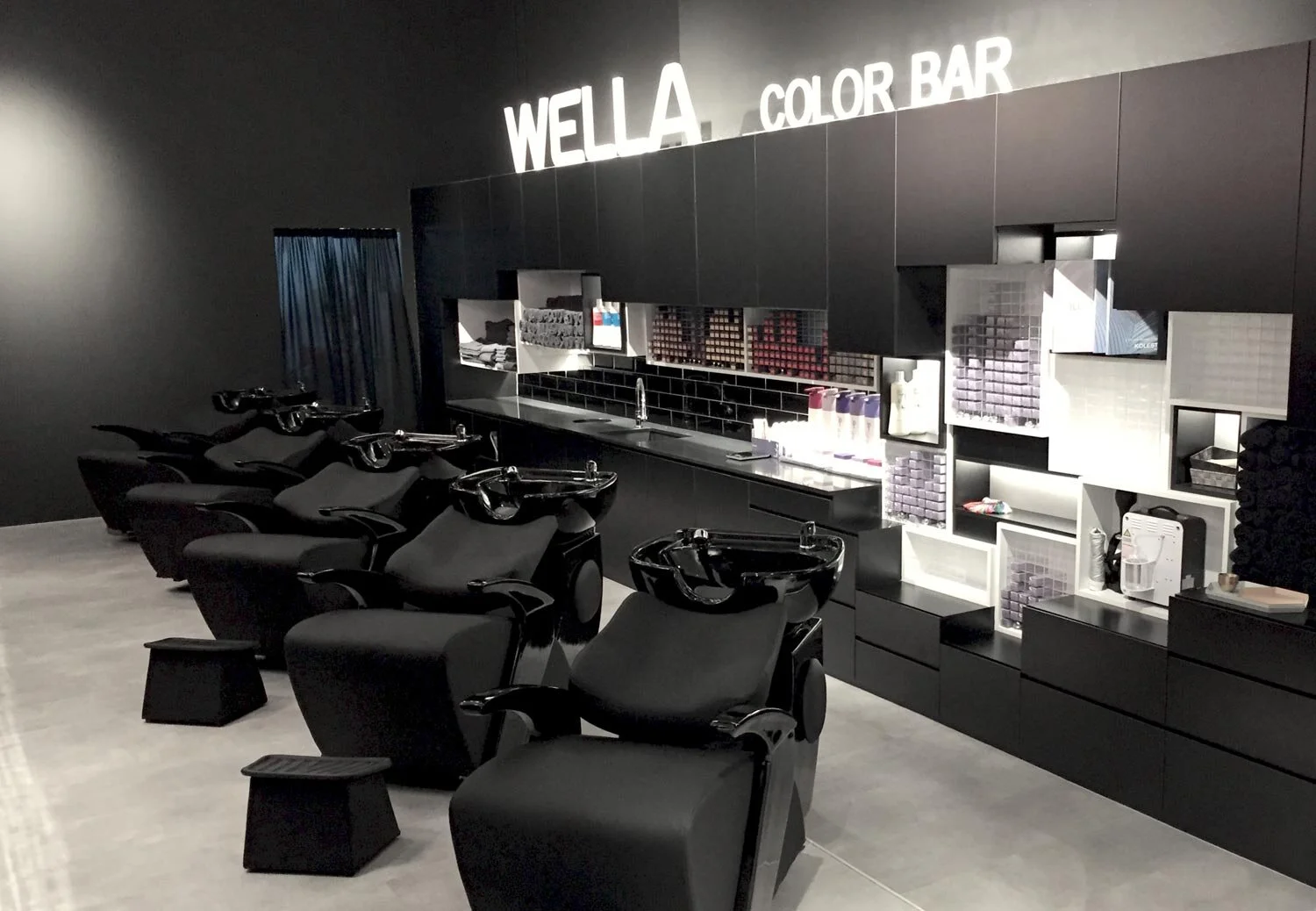 Our salon space can comfortably accommodate 15 clients at a time and everyone has their own mirror. This is the significance of our unique ceiling-high mirror.