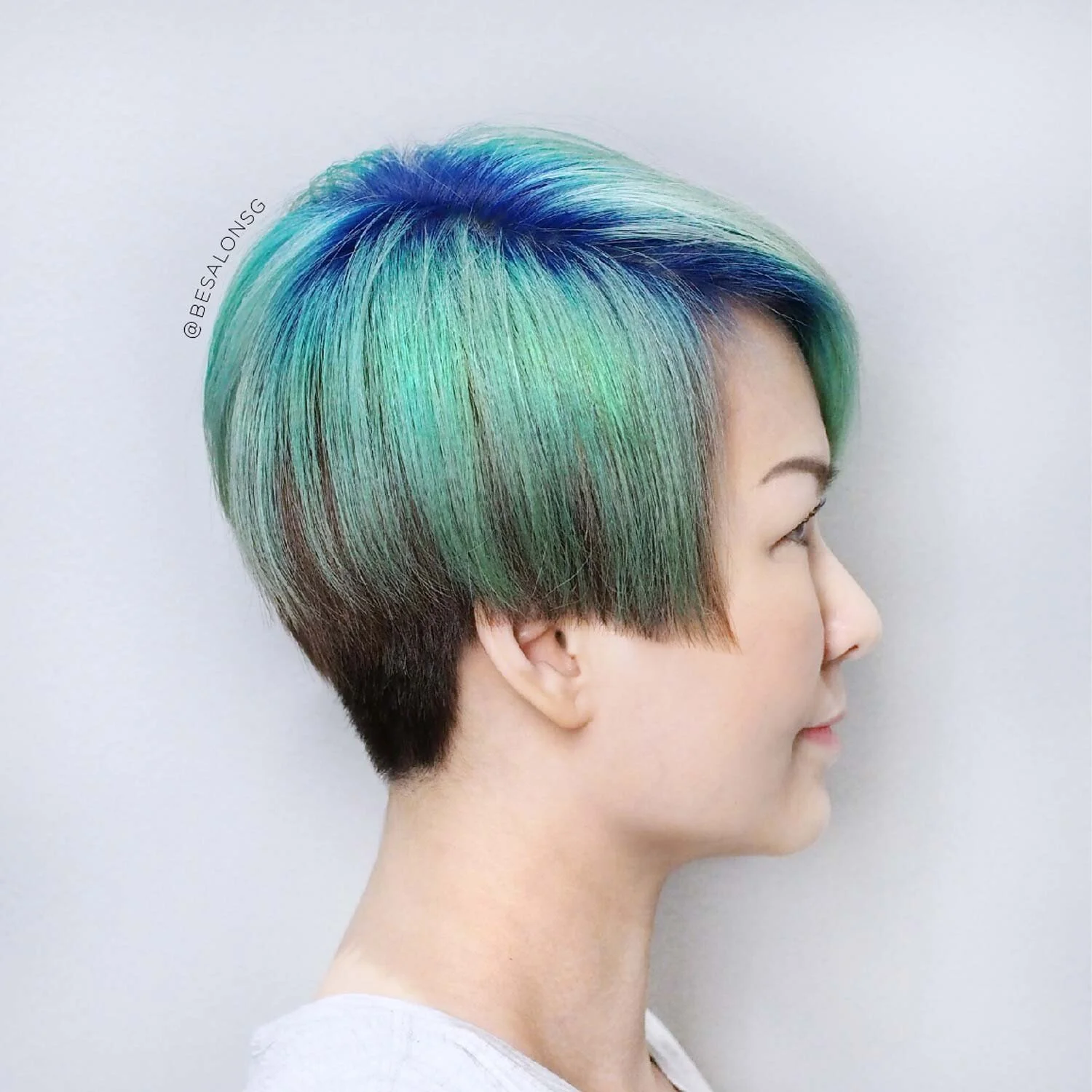 Aquamarine Short Hair with Vibrant Roots