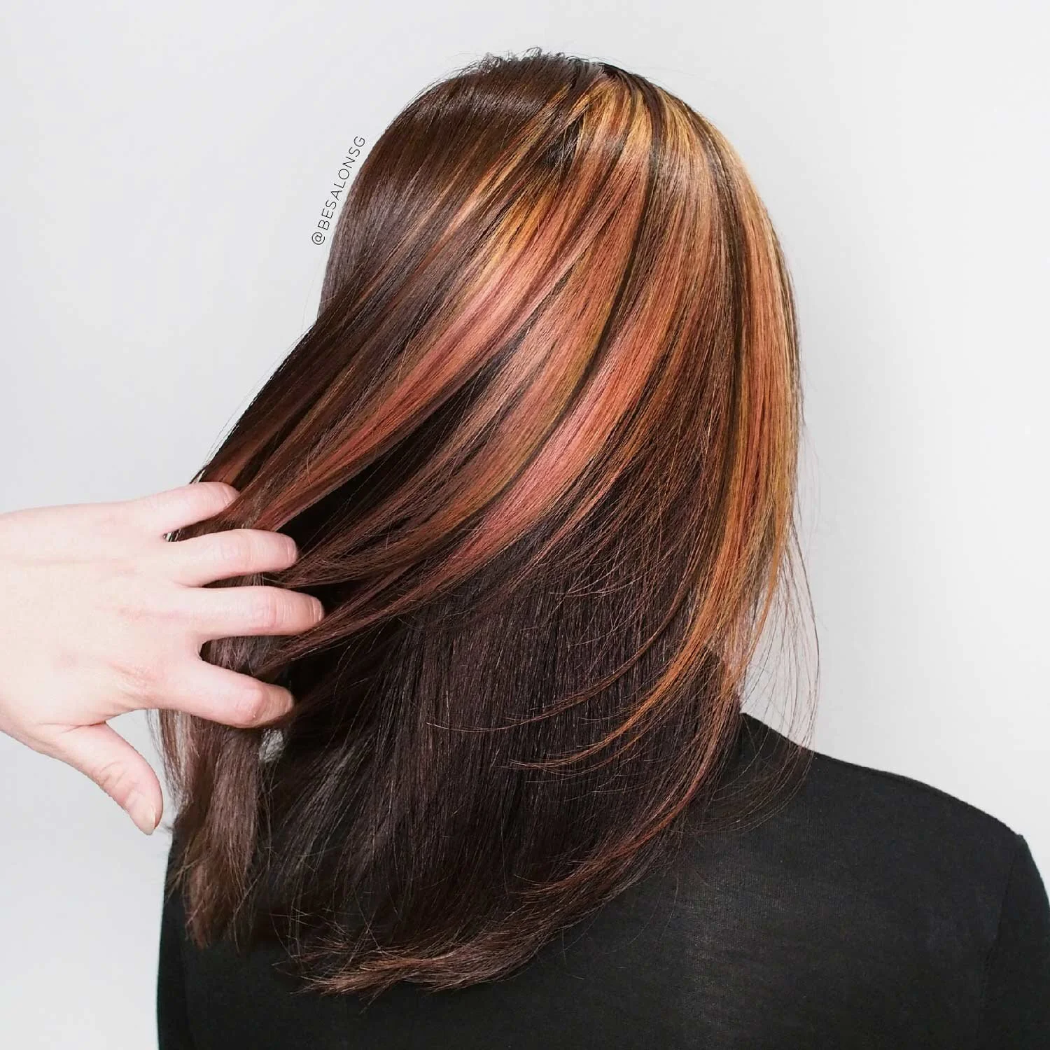 Peek-A-Boo Highlights
This citrus and berries peek-a-boo highlights is designed by our Leading Stylist, Chester Soh. It is perfect for the office ladies who wants to add a little creativity and fun to their hair but still be office-appropriate. Transform a classic haircut into a unique hairstyle just by adding a hint of your favourite shades with peek-a-boo highlights technique.   