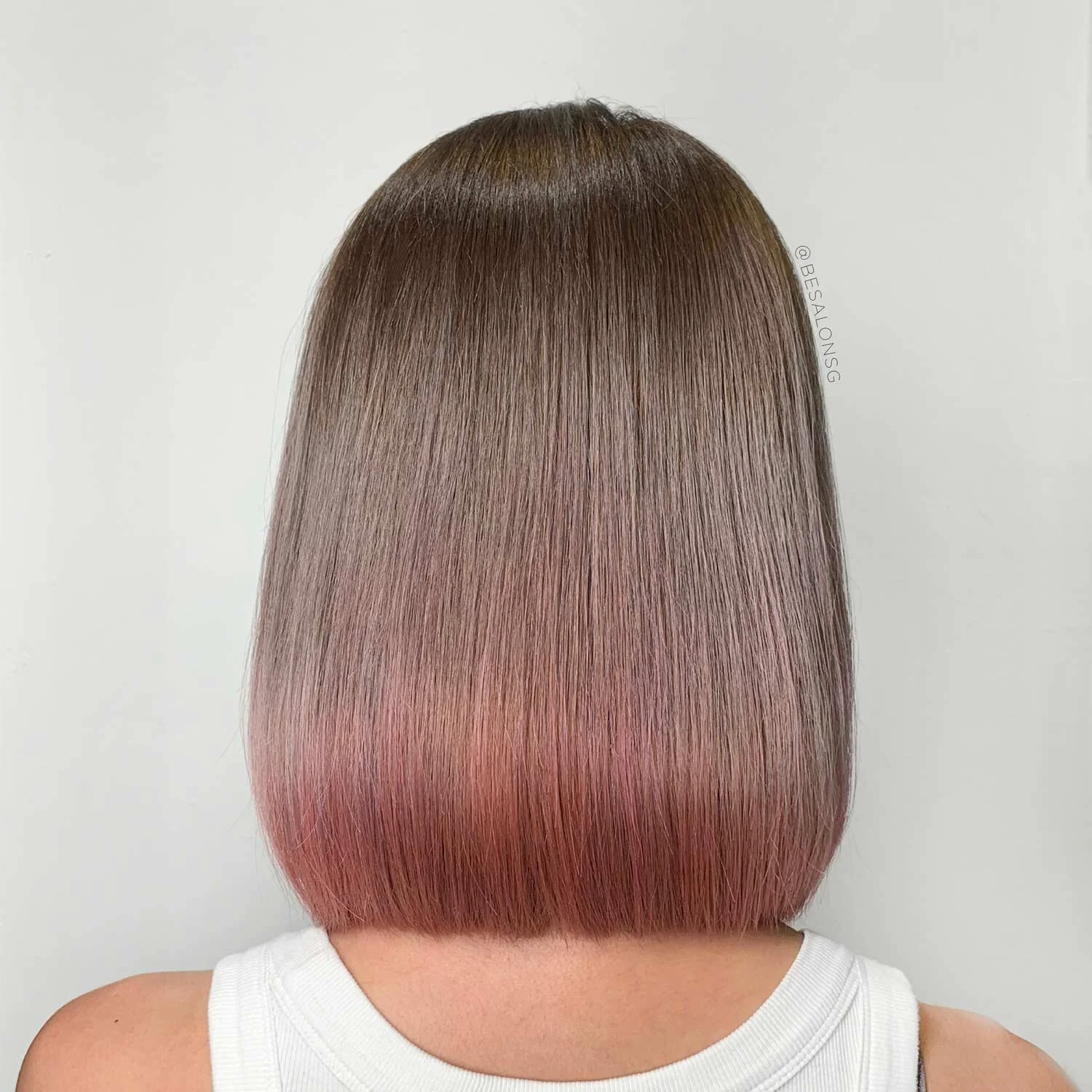 6. Dark Ash Brown with Pink Tips
Don't want a multicoloured hair the shouts "UNICORN"? This subtle dark ash brown and pink tips hair colour is the perfect design for you. We love the smooth gradation of colour done by our Creative Stylist, Darren Ooi. Other hair ends colours that goes well with dark ash brown shades are blue, turquoise, coral, and lilac.