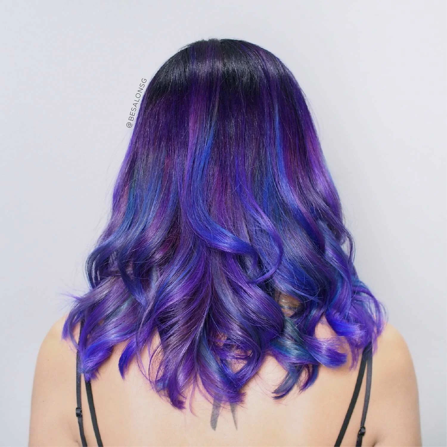 4. Mystical Amethyst Purple
Who says you have to go bright rainbow colours to be a unicorn? This hair colour is a mixture of deep blue and purple shades, which creates more depth and dimension in the hair. You can look like your favourite mystical creature with this colour combination too.